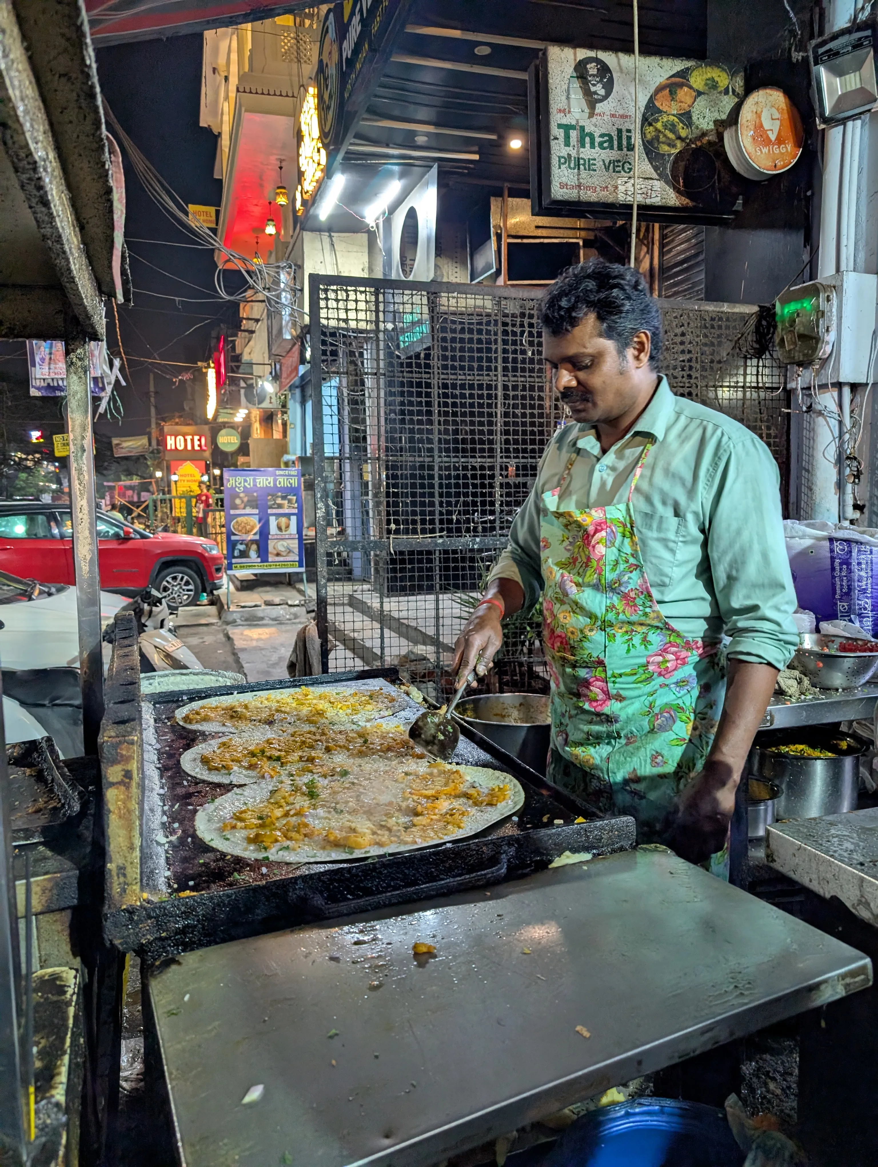 A dosa being prepared on a street griddle in Jaipur.