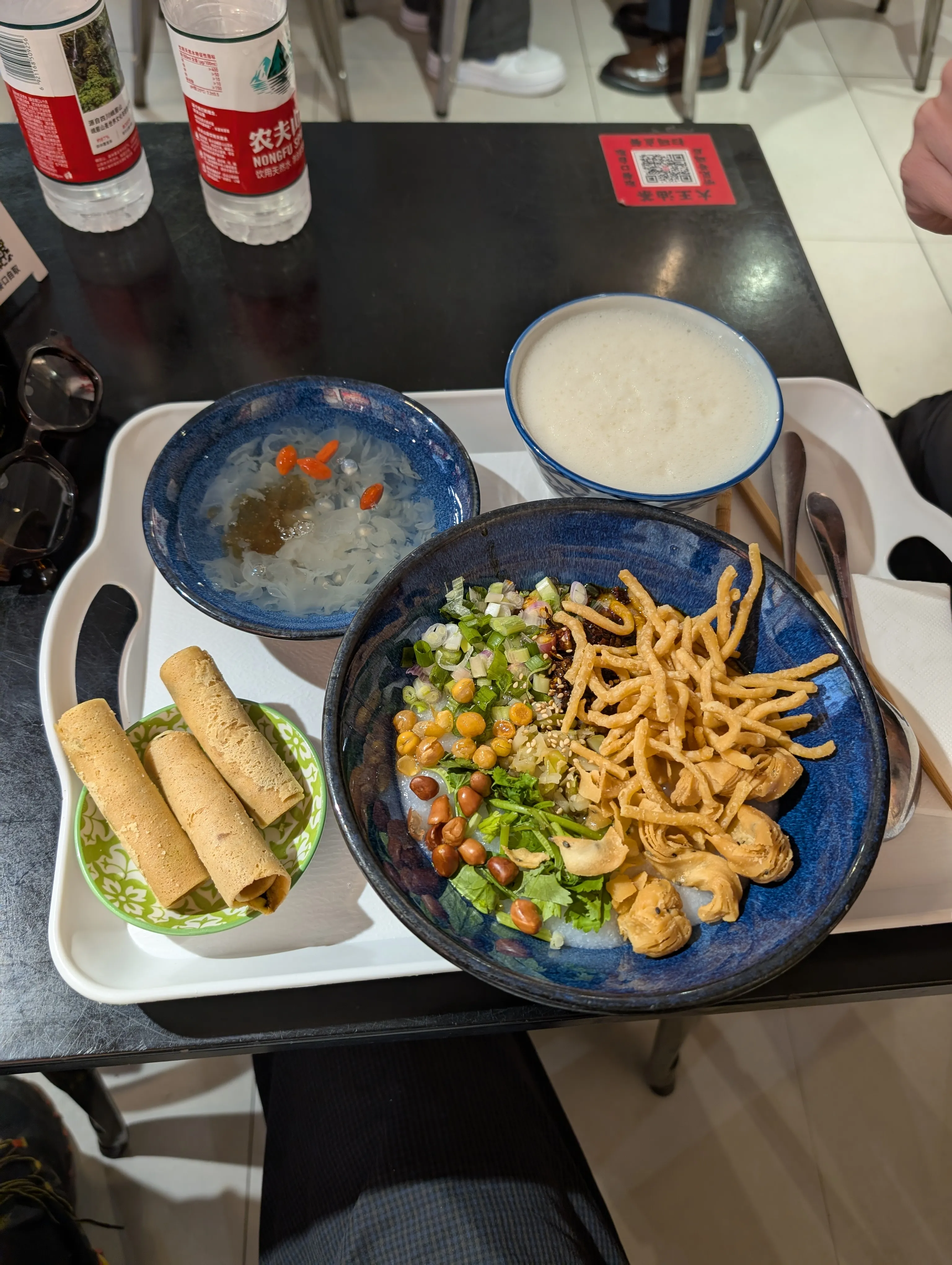Chongqing oil tea (you cha), a delicious savory rice flour porridge (not tea!) with crunchy fried toppings.
